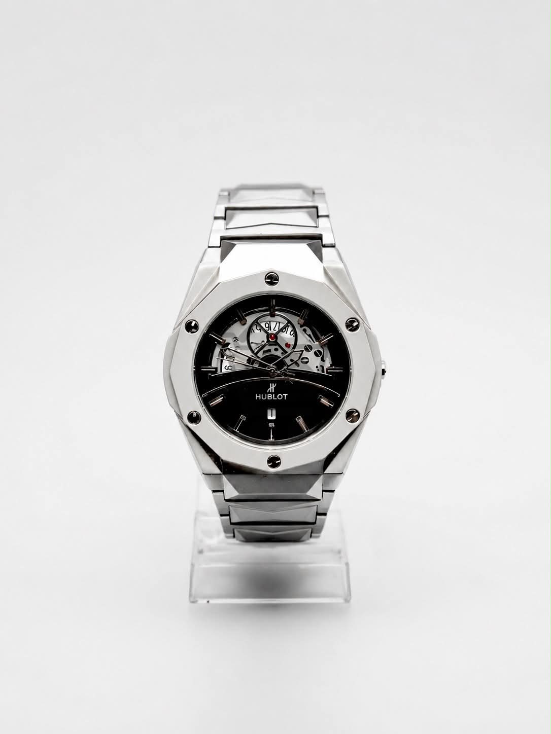 Men’s silver skeleton dial watch with stainless steel metal bracelet